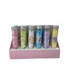 صابون معطر مضغوط بأشكال قلوب ودوائر صغيرة في علب أنبوبية