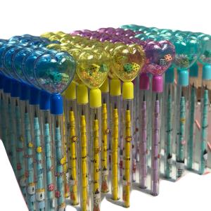 قلم رصاص مزخرف برأس قلب شفاف