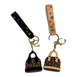 ميدالية حقيبة يد فاخرة - تصميم لويس فيتون